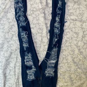 Ripped destroyed jeans